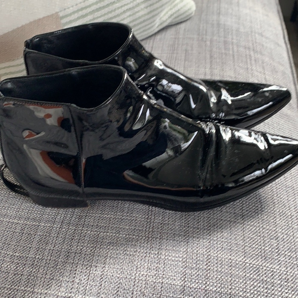 Miu Miu patent leather black bootie. To small for me.